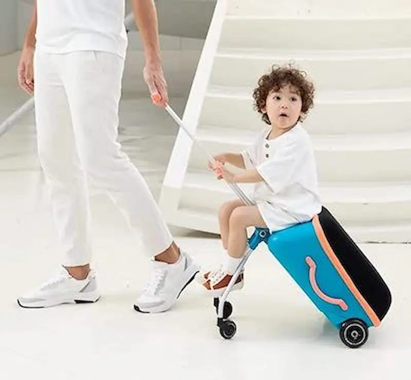 valise poussette pour enfant bleu destiné au voyage 